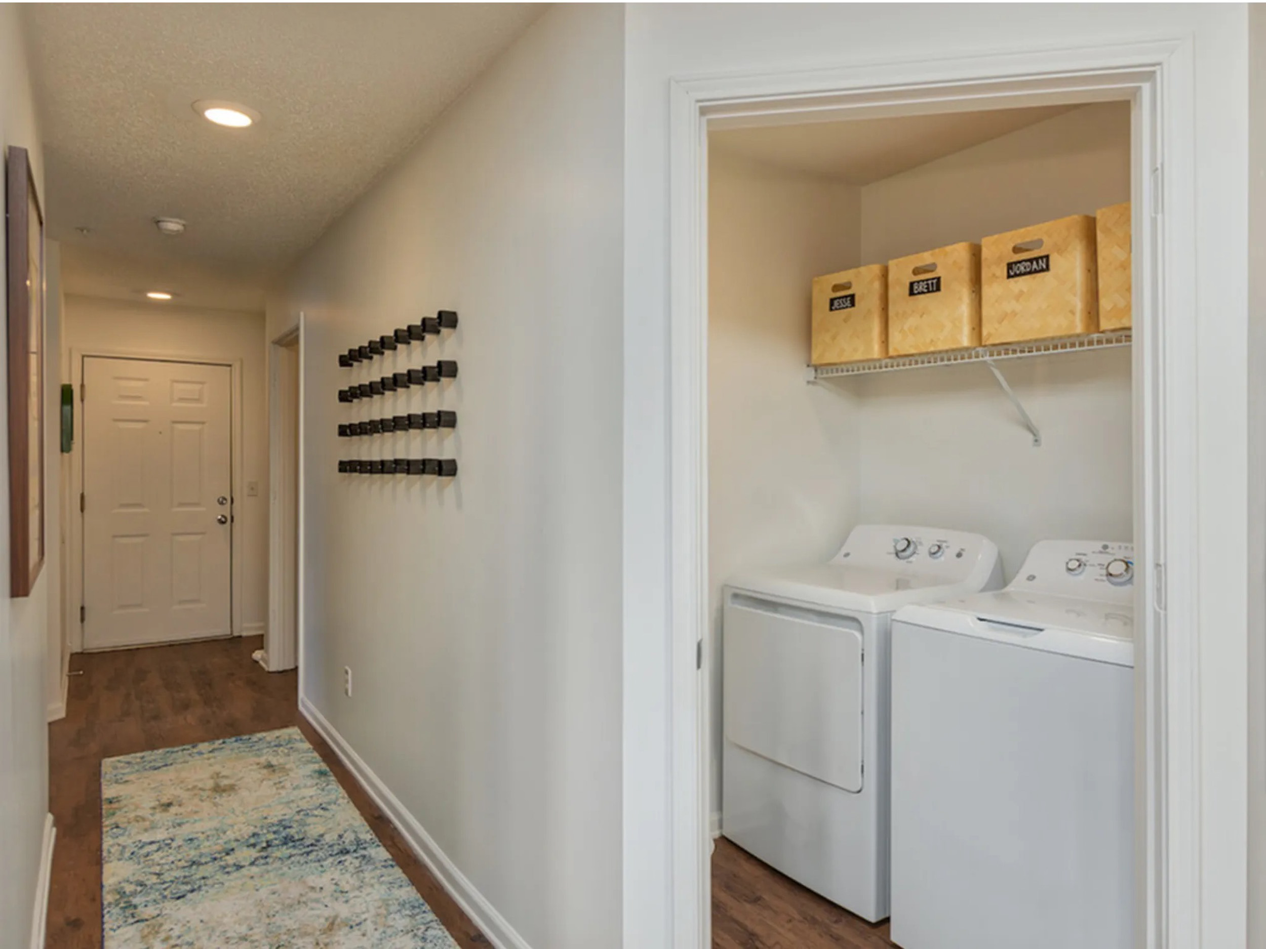 a laundry room with dryer and washer