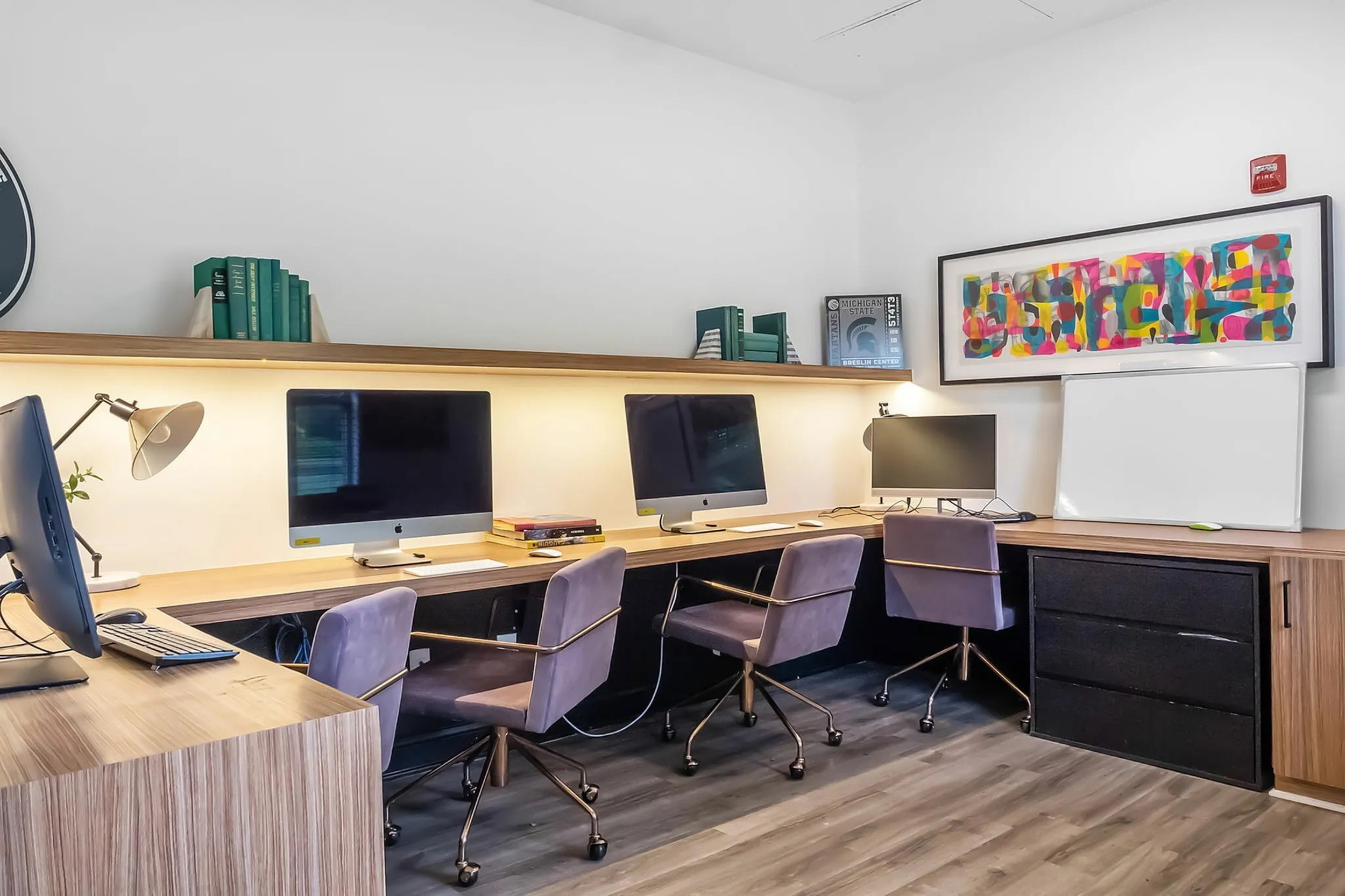 a room with computers and desks