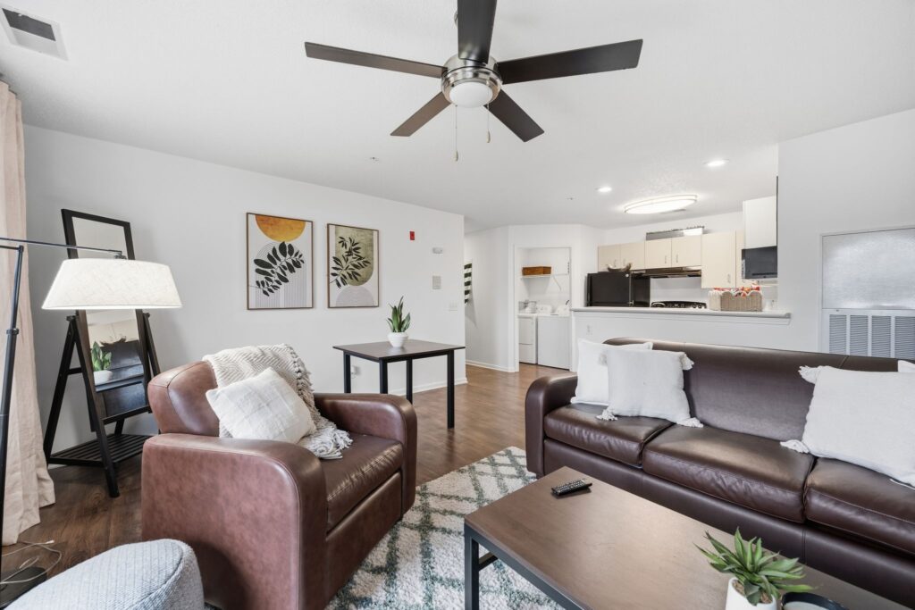 Model living room at 25 East